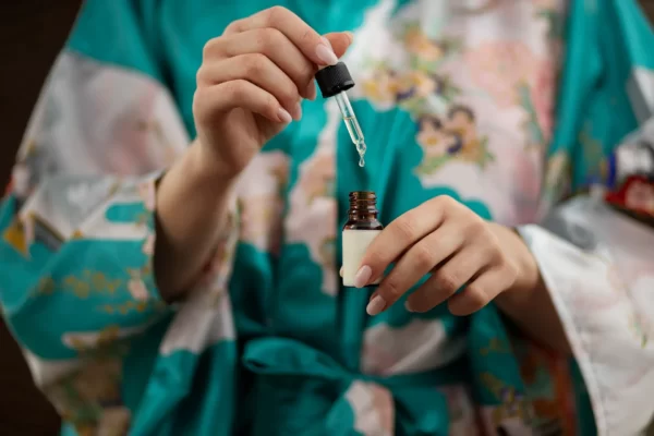front-view-hands-holding-serum copy